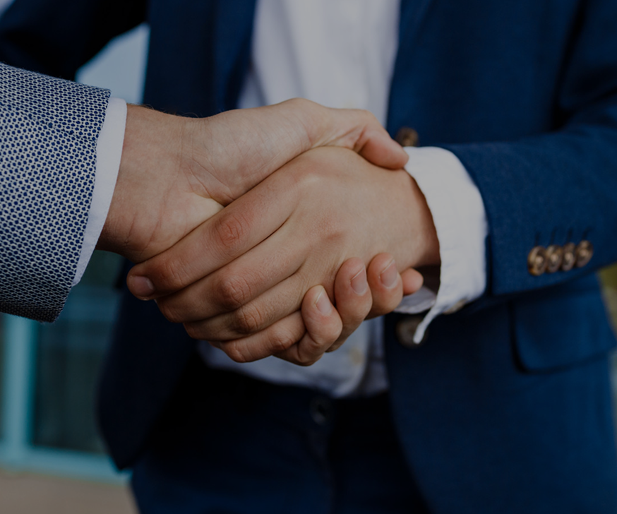 Business partnership handshake